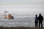 <strong>Vigil</strong><br /> In this case, a fisherman was washed off the rocks, leading to a major rescue attempt. Unfortunately, there was not a happy ending. This photo was later used to encourage vigilance when around the water.