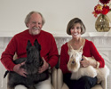 <strong>Couple Portrait</strong><br />A formal setting within the home also makes an effective portrait, with the pets as an added attraction. This photo of Olivia and Chuck was printed on aluminum for a most dramatic result.