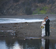 <strong>Small Weddings — The Beauty of the Setting</strong><br /> When the wedding is held in such a beautiful site, what can be better than the couple captured their, with their reflection in the ocean tide pool
