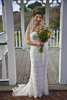 <strong>Small Weddings — The Dress</strong><br /> What would a wedding album be without the bride in a full length photo of her beautiful gown, in this case in front of the gazebo where the ceremony will take place.